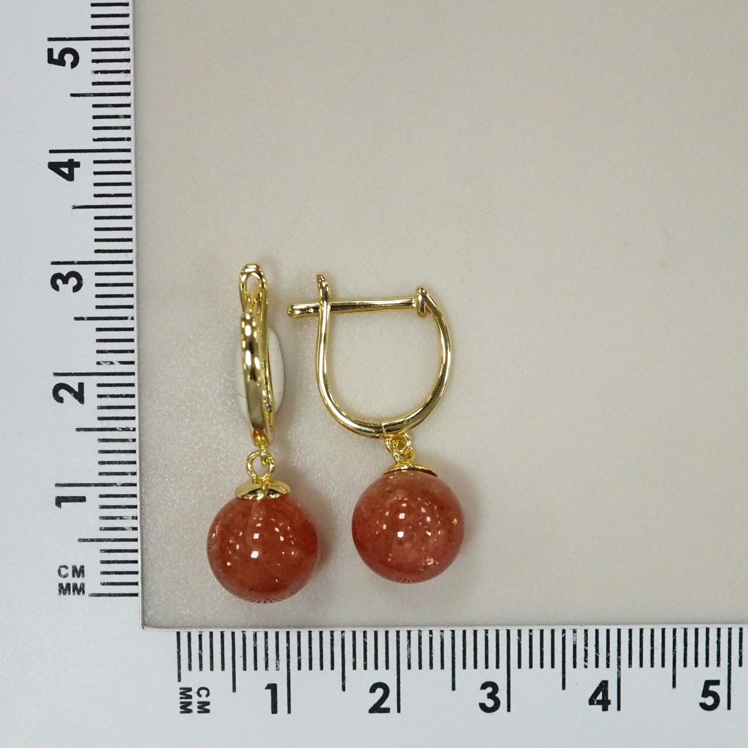 Серебряные серьги с солнечными камнями